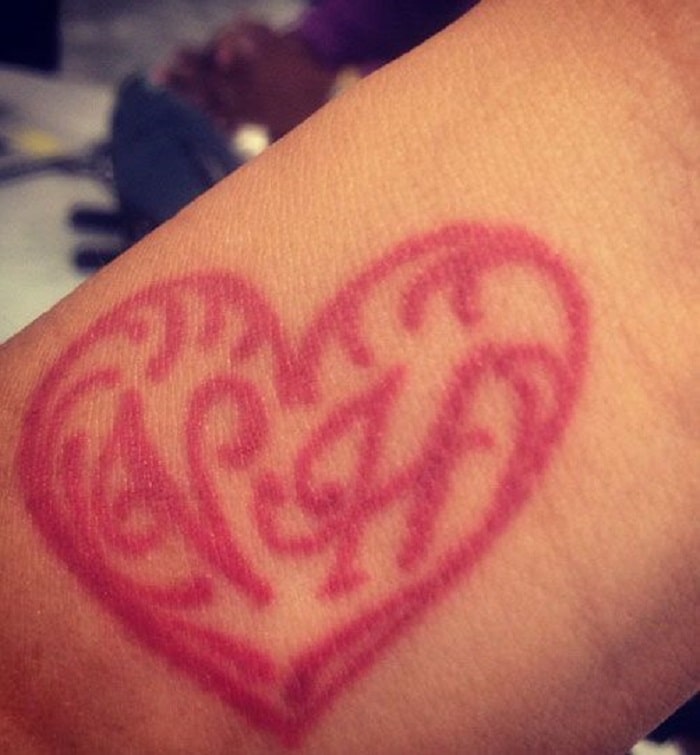 Tamar's tattoo of her ex-husband's initials.